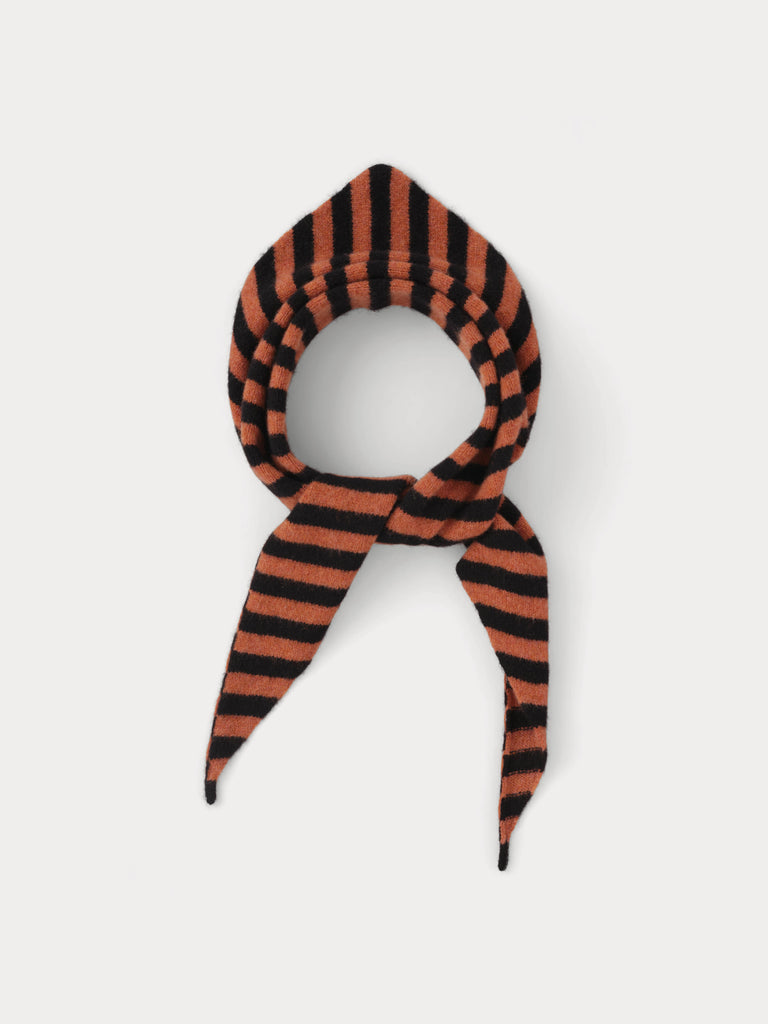 black and orange/pink striped triangle scarf tied in a knot