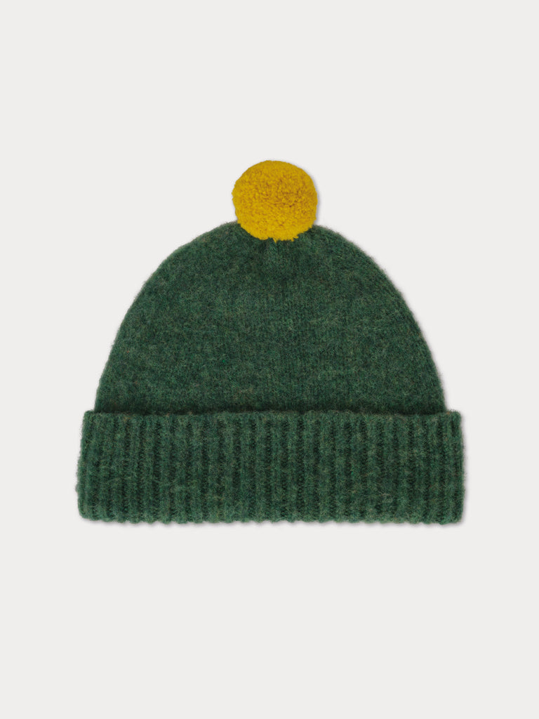 green beanie with yellow pompom