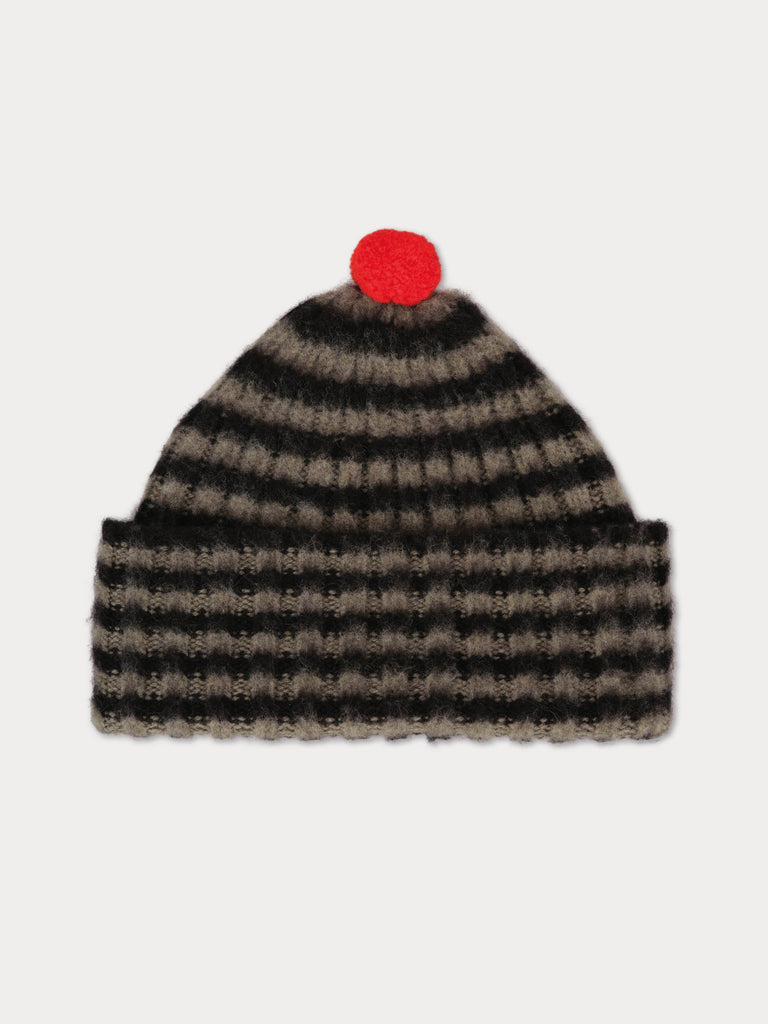black and grey striped beanie with red pompom