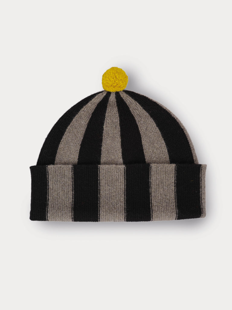 black and grey striped beanie with yellow pompom